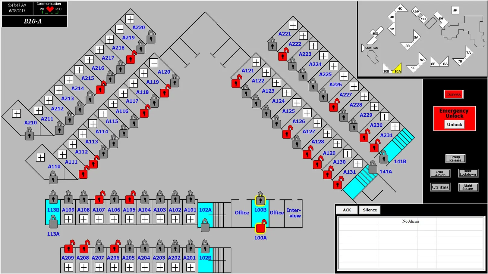 Housing unit touch screen programmed by AE, showing two tiers of cell doors with lock status, emergency unlock and an alarm panel