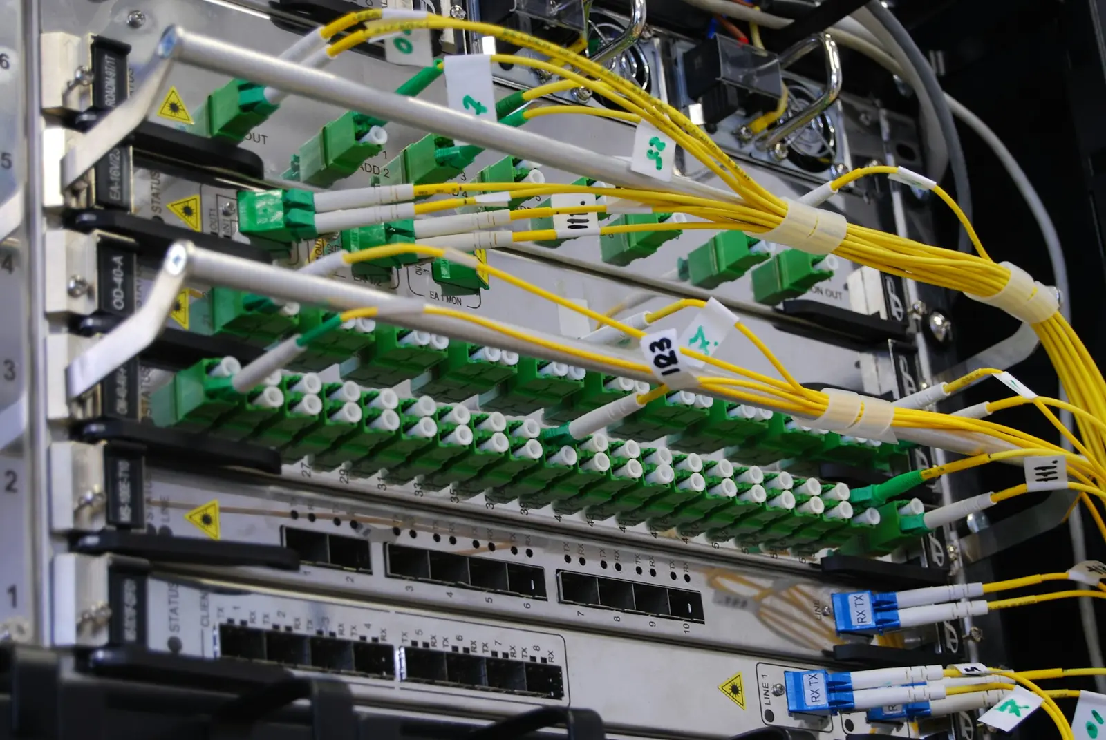 Fiber optic patch cables in a network rack